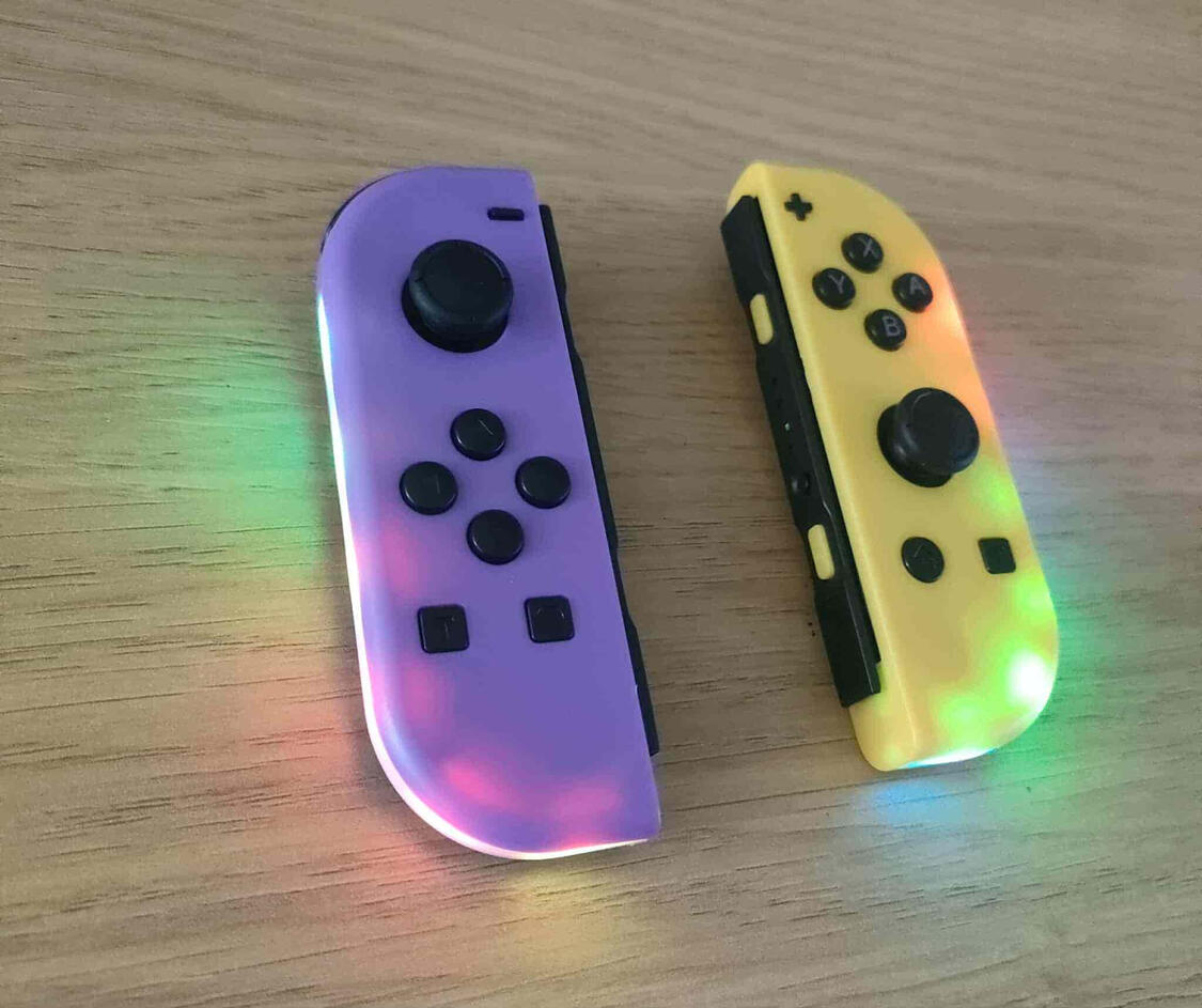 Custom Purple & Yellow Joy-Cons – Nintendo Switch Controllers (Ireland) Purple and yellow LED Joy-Con controllers for Nintendo Switch, built for comfort and competitive gaming – ships from Ireland